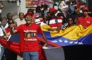 Decenas de dominicanos participaron este en una peregrinación para pedir por la recuperación del presidente de Venezuela, Hugo Chávez, en Santo Domingo (República Dominicana). EFE